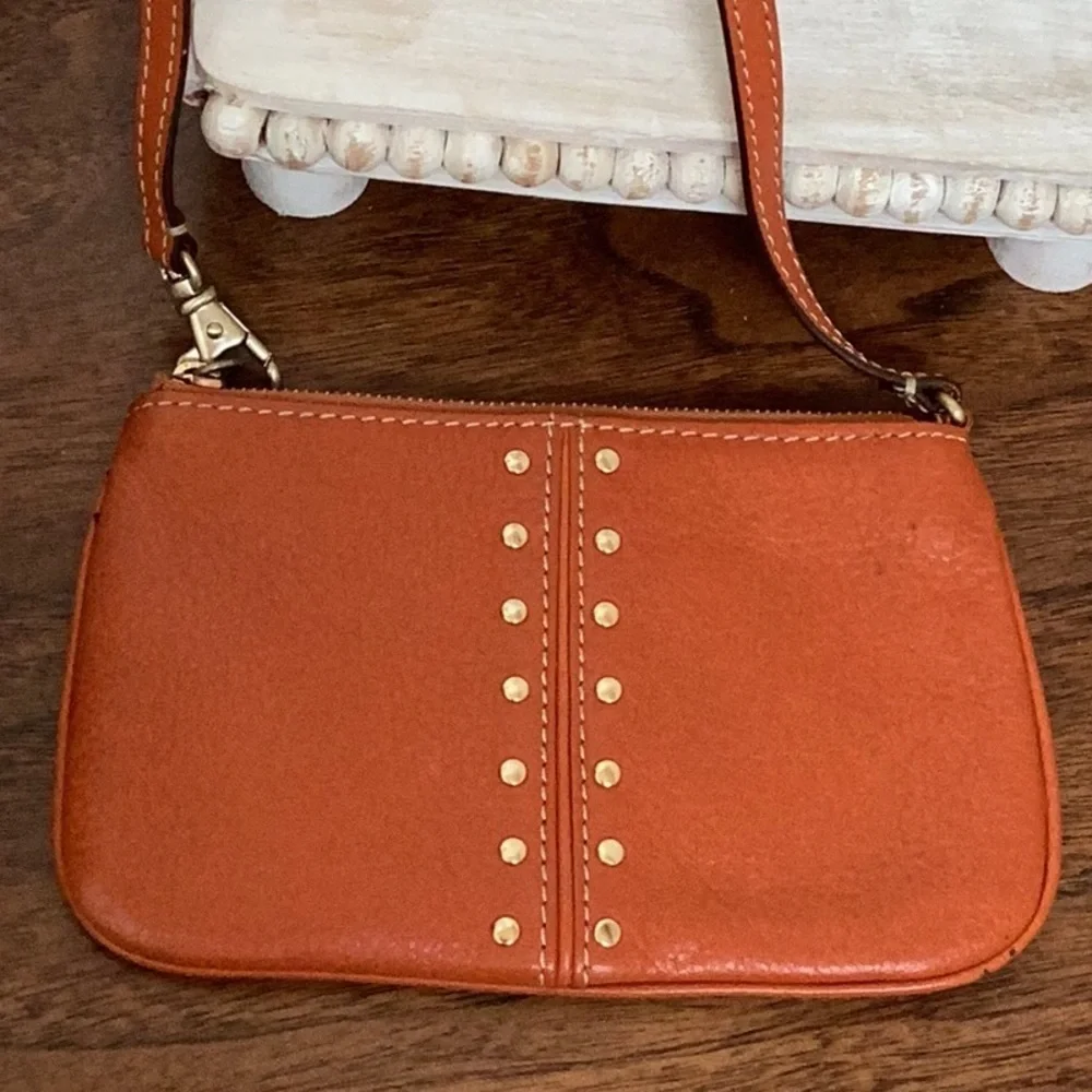 Michael Kors orange, gold tone Studded wristlet, clutch, zipper pouch